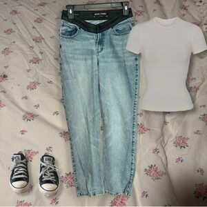 mid-waisted, light-wash blue Social Tourist mom jeans